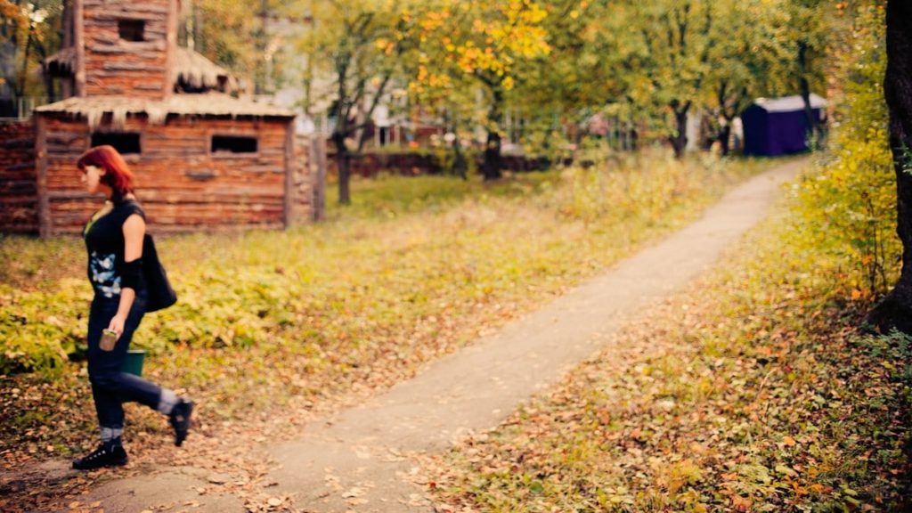 woman walks at rural area