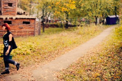 woman walks at rural area